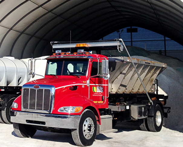 Commercial parking lot snow plowing and salting by DJ's Landscape Management