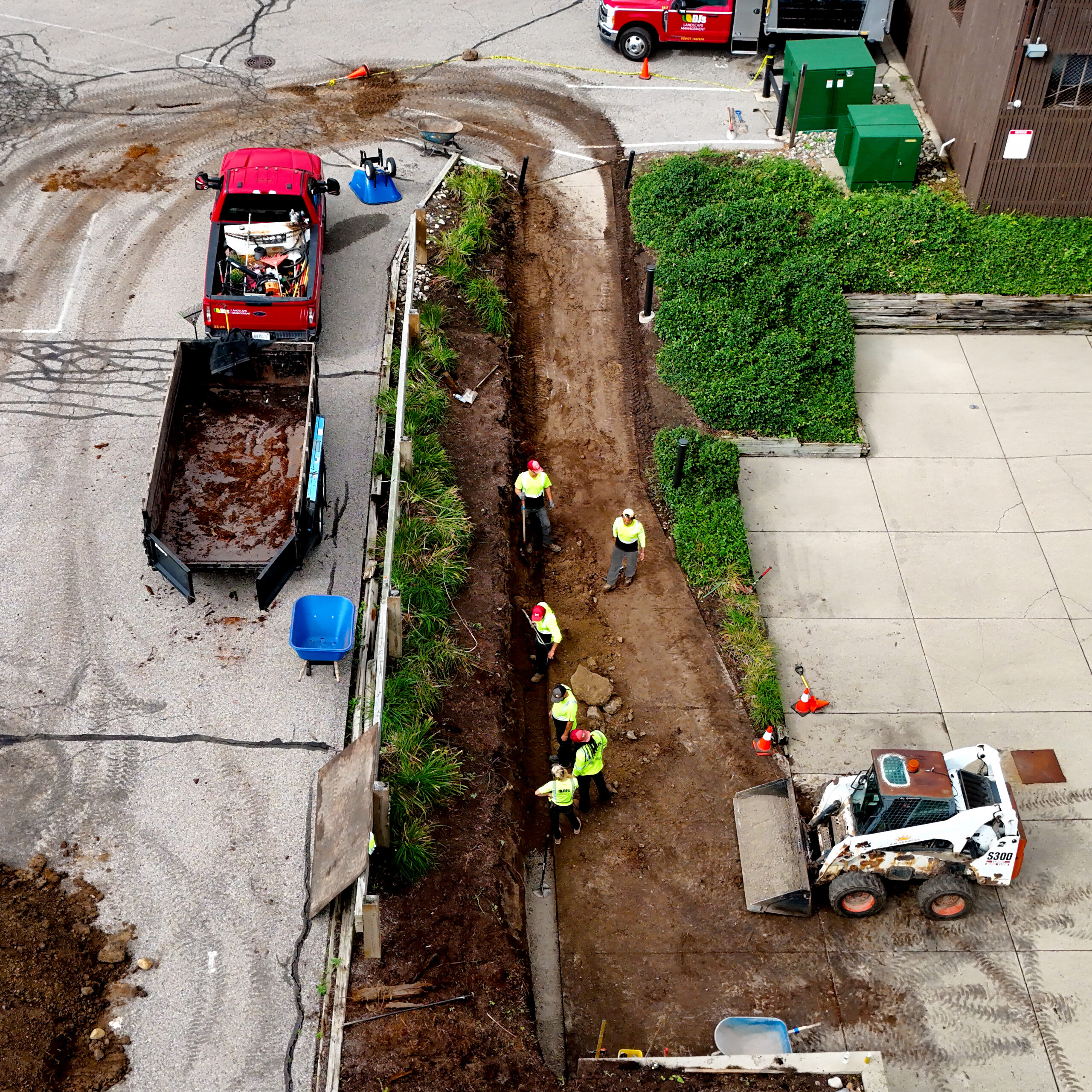 DJ's Landscape Management crew working on a landscape construction job